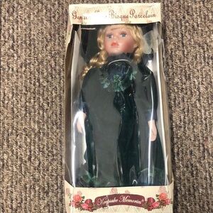 Keepsake Memories Bisque Porcelain Doll in Dark Green Dress